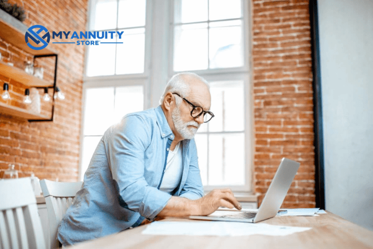 Ibexis Life and Annuity Company Ratings and Review Senior Man at table with Laptop