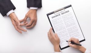 Lawyer draw up divorce decree on planner