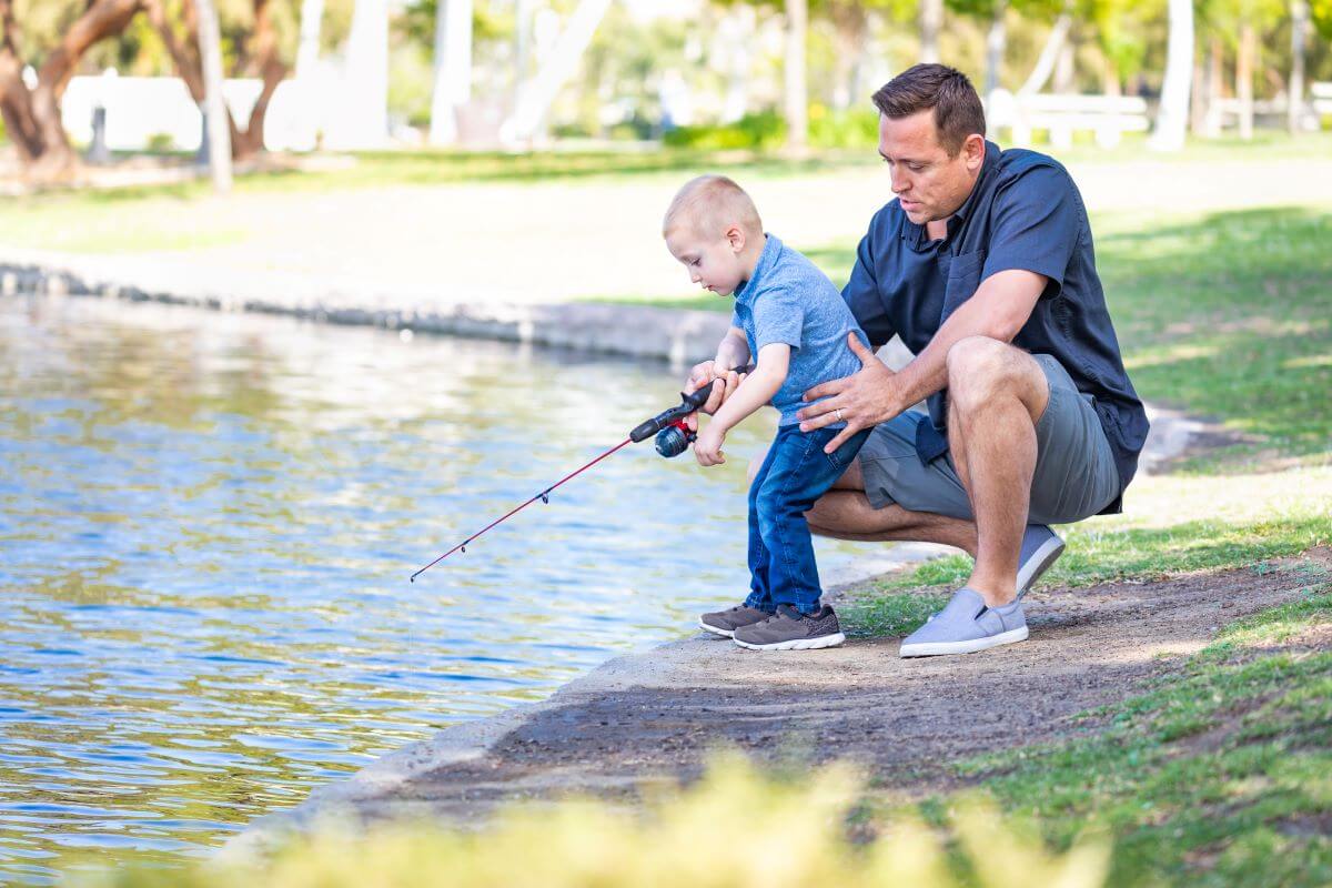 man fishing with grandson