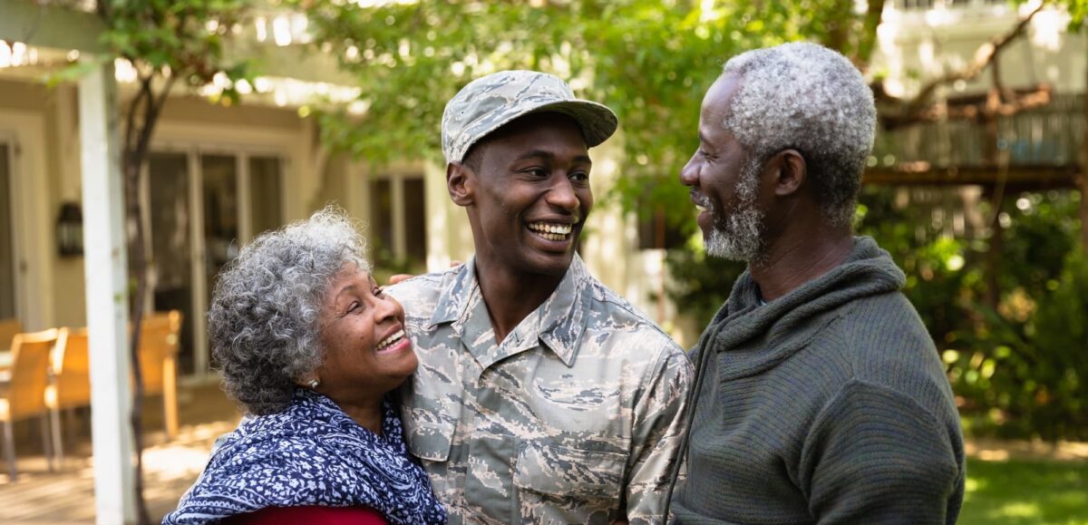 Sagicor life insurance company profile picture of soldier with parents